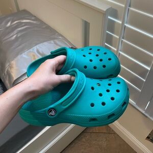 Teal crocs